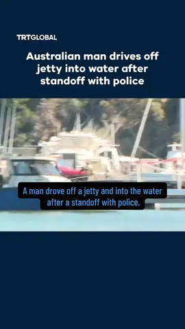 A man drove off a jetty and into the water after a standoff with police, narrowly missing a police boat, in Perth, Australia, on April 30. Local media reported that the vehicle was suspected of being involved in an earlier traffic incident. Police apprehended the suspect, and he was taken from the scene in an ambulance. #australia #boat  Source@TRT World 