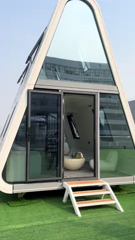 🚀 Revolutionize Your Living Space with Triangular Loft Capsules! 🏠✨ Unique Design: With a futuristic triangular shape, these lofts are not just buildings; they're statement pieces. The slanted walls and multi - level layout create a dynamic, visually stunning interior that will make your property stand out on any TikTok feed. Maximize Every Inch: Our loft capsules are engineered to optimize space. The mezzanine level provides extra living or storage space, while the open - concept design allows for endless customization. Whether it's a cozy home, a trendy Airbnb, or a creative workspace, the possibilities are limitless! Quality & Durability: Built with top - notch materials, these capsules are sturdy, weather - resistant, and built to last. From the sleek exterior to the well - crafted interior finishes, we never compromise on quality. Easy Installation: Don't stress about complex construction! Our triangular lofts are designed for quick and hassle - free assembly, getting you into your dream space in no time. 💥 Ready to elevate your living experience? Tag us #TriangularLoftCapsules and show us how you'd style your unique space! 📍 DM for more details and let's bring your vision to life! #capsulehouse #trianglehouse #prefabhouse 