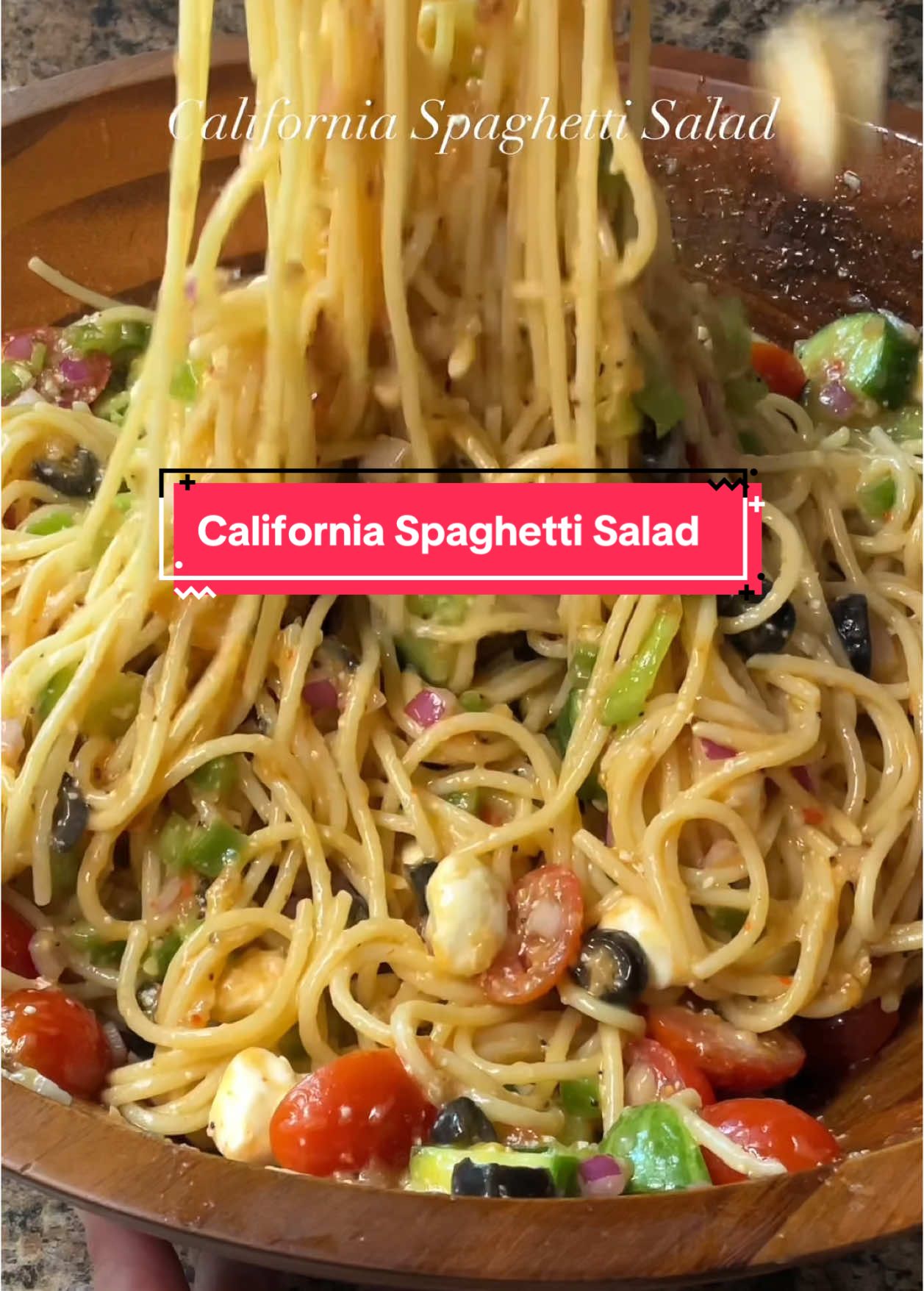 California spaghetti salad is the perfect dish for all your summer cookouts! But it is even great for meal prep! #spaghettisalad #pastasalad #pasta #spaghetti #cookout #Summer #EasyRecipe #saladsupreme #yum 