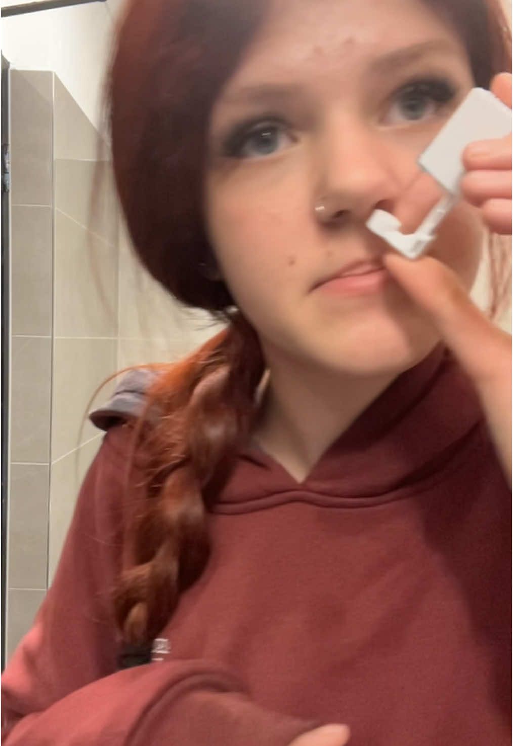 Piercing my nose in the school bathroom 