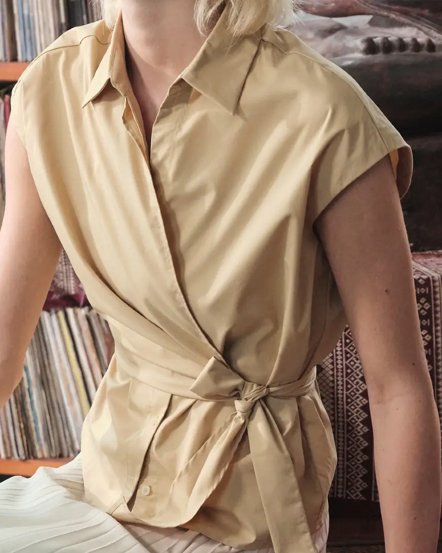 Wear it your way, all day. The June Top adjusts with you. Tie it high or low, tight or loose. Crafted from a soft, breathable blend of Supima and Sorona that's made to last. Now available in camel, black and lilac. Shop in store and online.