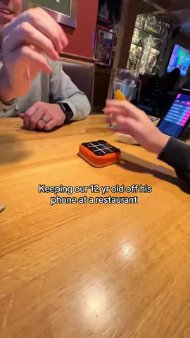 A fun family game that fits in your pocket! #tictactoe #restaurant #screenfree 