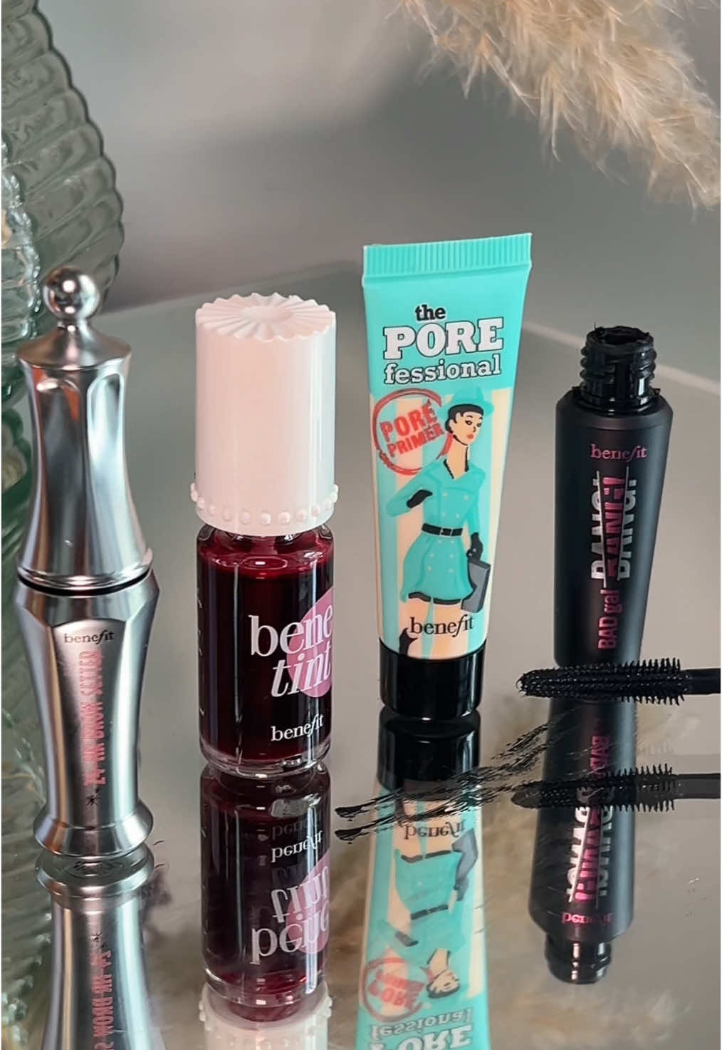A makeup bag of mini benefit best sellers 💫 benefit Moonlight Delights set includes:  BADgal BANG! mascara, the POREfessional, primer benetint rose and 24-HR Brow Setter, plus a free makeup bag  🤍   #allbeauty #benefit #giftset #minis #makeupminis #travelminis