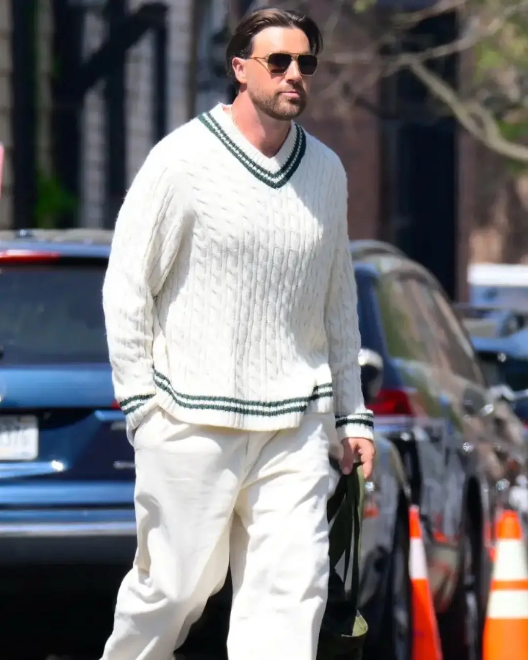 Travis Kelce was spotted in New York City Thursday as his girlfriend Taylor Swift continues to stay out of the spotlight. 🤍 The Kansas City Chiefs tight end was seen posing for a photo shoot in front of a sleek green vintage Chevrolet Chevelle SS in Manhattan. 📸: TheImageDirect