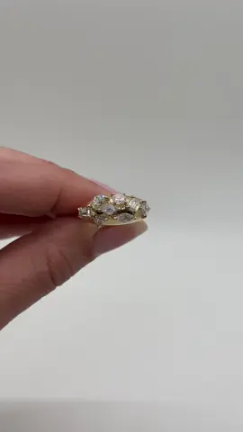 The Azadi Bombe Cluster Ring features a hybrid prong setting with 8 rare quarter-carat stone cuts: tapered baguette, trilliant, half moon, lozenge, carre, ashoka, octavia, and marquise. #uniquejewelry #goldring #diamonds 