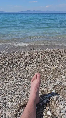 so relaxing #beach #greece #rhodes #beautifulday #clearwaterbeach #clearskies #waves #soundofthesea  #beachfeet #manfoot #calm 