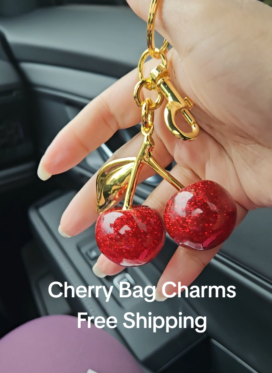 With a price like this and free shipping,  you might as well get this cherry bag charm in every color! #bagcharm  #cherry  #bagcharms #cherrykeychain  #keychains  #keychainaccessories  #cherrybagcharm  #freeshipping  #tiktokmademebuyit 
