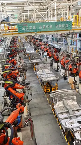 Automated Robotic Assembly Line in a Factory 🤖🏭🚗 #Robotics #AssemblyLine #AutomotiveManufacturing
