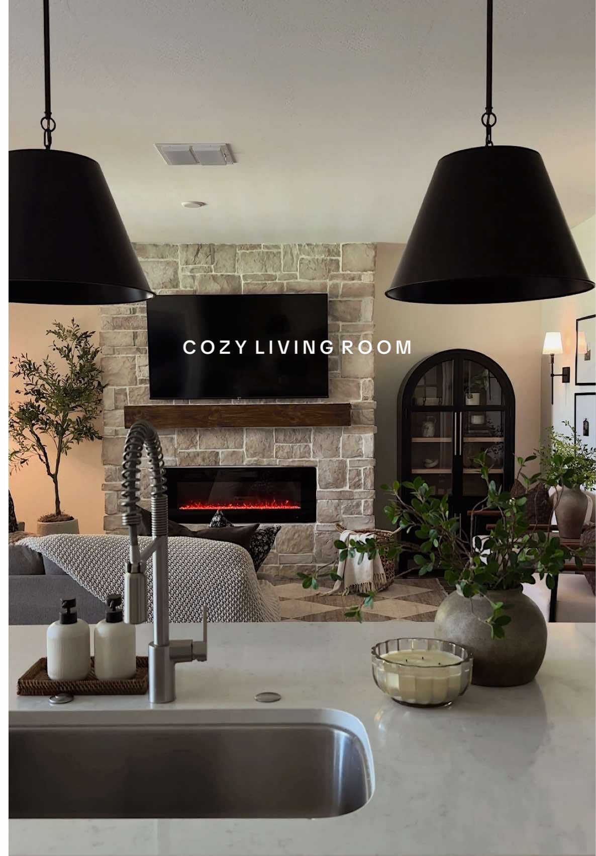 From all gray everything, to a cozy, warm living room I never want to leave 🤎  #Home #neutralhome #livingroom #livingroomdecor #livingroominspo #neutraldecor #earthyhome #organicmodern #homedesign #homebeforeandafter #hometransformation  