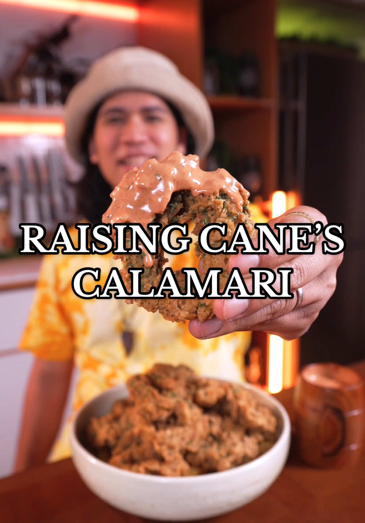 Raising Cane’s Calamari 🦑 INGREDIENTS: Calamari Marinade: - 1kg squid rings - 1 tbsp garlic, onion, sage, paprika, oregano powder - 1 tbsp worcestershire sauce - 1 tbsp hot sauce (i’m using cholula) Dry Batter: - 1 1/2 cup all purpose flour and 1/2 cup cornstarch) - 1 tbsp garlic, onion, sage, paprika, oregano powder -  Pepper to taste Wet Batter: - Place half of your dry batter in a separate bowl - 330 ml beer - 1 egg Served with: - Crinkle cut fries Raising Caines Sauce: - 1 ½ cup mayonnaise  - 1 cup of tomato ketchup - 1 tbsp worce- stershire sauce - 1 tsp apple cider vinegar - 1 tsp White pepper - 1 tsp paprika, onion, garlic powder INSTRUCTIONS: - Start by seasoning your calamari with everything under calamari marinade. Toss and mix until each piece is coated, and set aside for later. -  Make your dry batter by whisking together in a bowl all the ingredients under dry batter - Place half of that mixture in a separate bowl and add an egg and a beer. Whisk until it forms a thick batter. - To prepare your Raising Cane’s sauce, place each of the ingredients under sauce in a bowl. Adjust to taste.  - Take each piece of calamari and coat it first with dry batter, then wet. Repeat one more time before frying at 165C in a pan with hot oil. Serve with fries and enjoy! #asmr #cookingasmr #Calamares #Calamari 