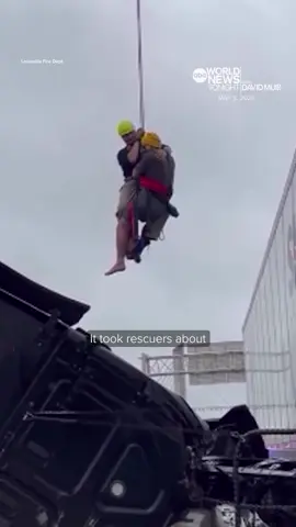 #DavidMuir reports on the dramatic #rescue of a #truckdriver in #Louisville, #Kentucky, who made a harrowing 911 call after his semi-truck crashed on the Kennedy Bridge and was left dangling over the edge. #WorldNewsTonight #News