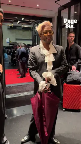 Law Roach strutting his way back into The Mark Hotel after the 2025 Met Gala. 👏