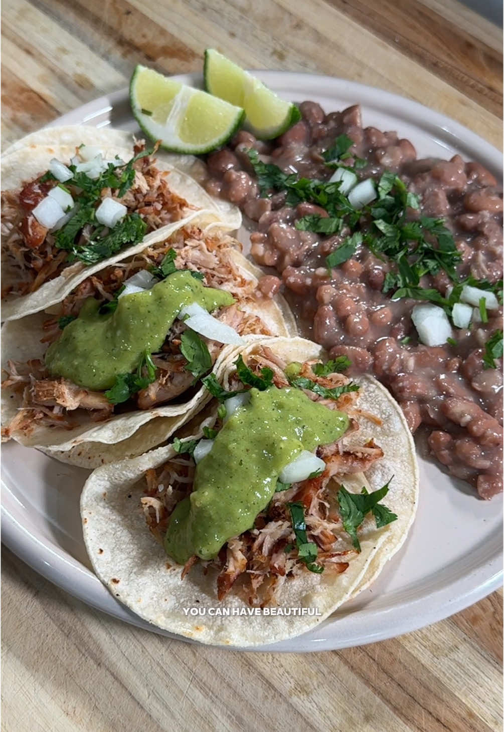 Recipe ⤵️ Beautiful Carnitas in a fraction of the time 🐖🤍 Ingredients: - 4lbs pork butt - 1 lb lard  - 1/2 white onion  - 1 head of garlic  - 1 can Pepsi   - 3 large bay leaves  - 1/2 tsp oregano  - 1 large orange  - 3 cloves  - 1 tsp pepper  - Neutral oil  Directions: 1. Cut your pork butt into large chunks. Trim any excess fat. You want a little but not a huge fat cap.  2. Drizzle with oil, and season with 1 1/2 tbsp salt, and pepper. Rub the seasoning all over.  3. Set your pressure cooker to sautée on high, add about 1/2 c of lard and allow it to melt. 4. Sear off your meat in batches until they develop a nice crust.  5. Once all your meat is ready take it out, add in the rest of your lard. Once it’s melted add your meat back in.  6. Add your orange juice with the flesh, garlic, onion, bay leaves, oregano, heavy pinch of salt, and cloves.  7. Seal her up, and pressure cook on high for 30 mins.  8. After it’s done safely remove it from pressure cooker, add to large tray/bowl and shred. Pour over some of the broth, and cover for 5 mins.  9. Before serving fry in a skillet with a bit of oil to get it nice and crispy. Adjust salt to taste here.  10. Serve with limes, salsa de aguacate, tortillas, rice, beans, and enjoy babe! #mexicanrecipes #carnitas #instantpotrecipes 