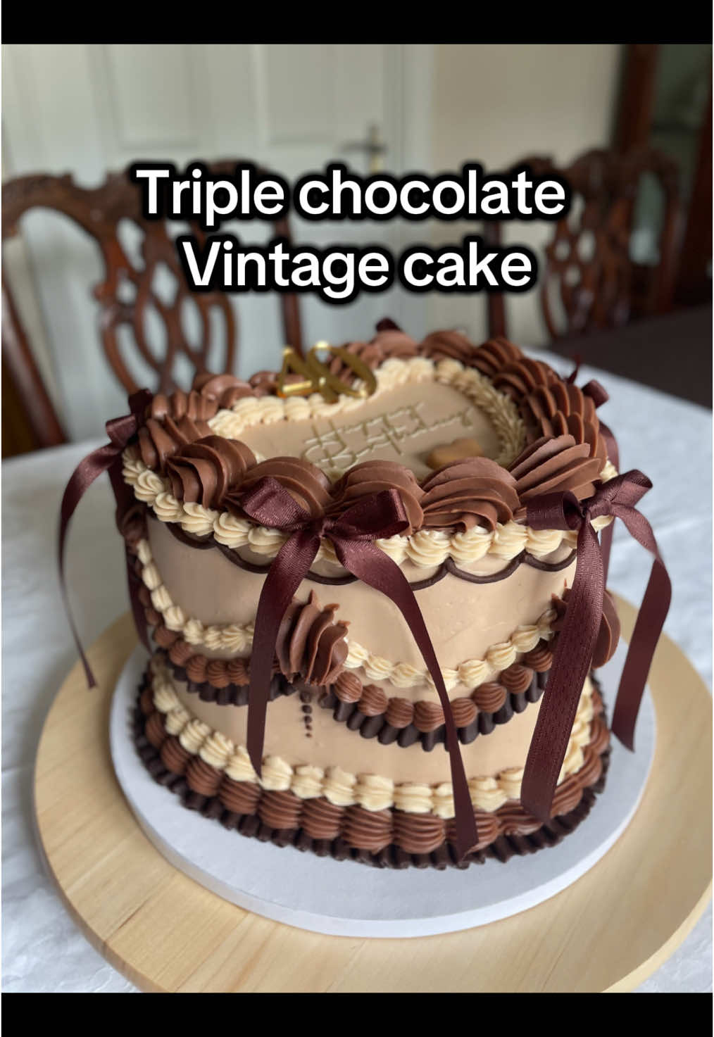 Pure indulgence - triple chocolate vintage heart shaped cake with elegant bows. I used white, milk and dark chocolate frosting to decorate this beauty 💖 #chocolatecake #chocolatevintagecake #vintagecake #birthdaycake #bakedwithlove #cakesinnewcastleupontyne #caketok #triplechocolate 