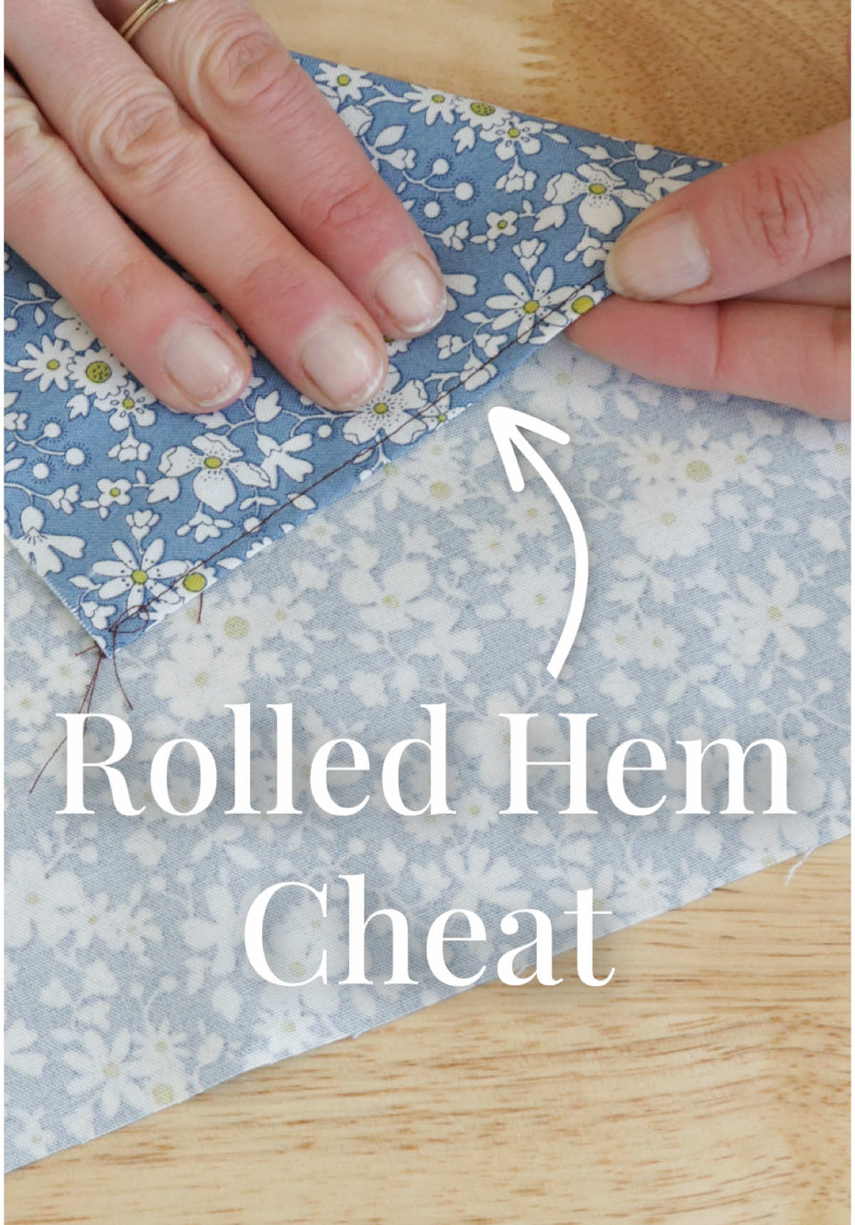 Not everyone has a rolled hem foot on hand, here’s what to do instead. Sew a baby hem instead! 1. Sew a line of basting 1/8 inch below your hem allowance all the way around. 2. Press fabric to the wrong side along the stitching line. 3. Now stitch a scant 1/8 inch in from the bottom of the folded edge all the way around.  4. Carefully trim the excess fabric as close to your stitching line as you can.  5. Finally, stitch the hem down and press.  Now you have a baby hem, just like a rolled hem! #seamwork #sewingtok #sewinghacks #sewingtutorial #howtosew 