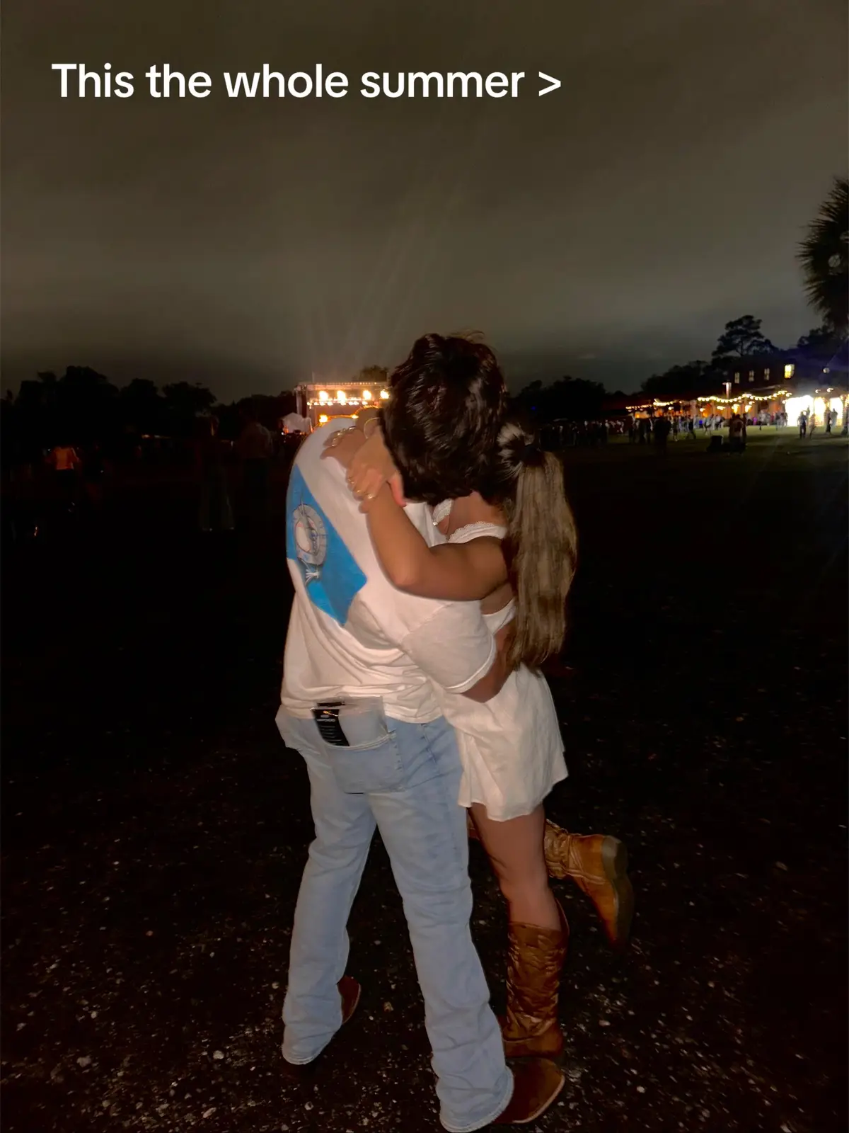 Country concert. My bf. A beer. & an emergency poncho 