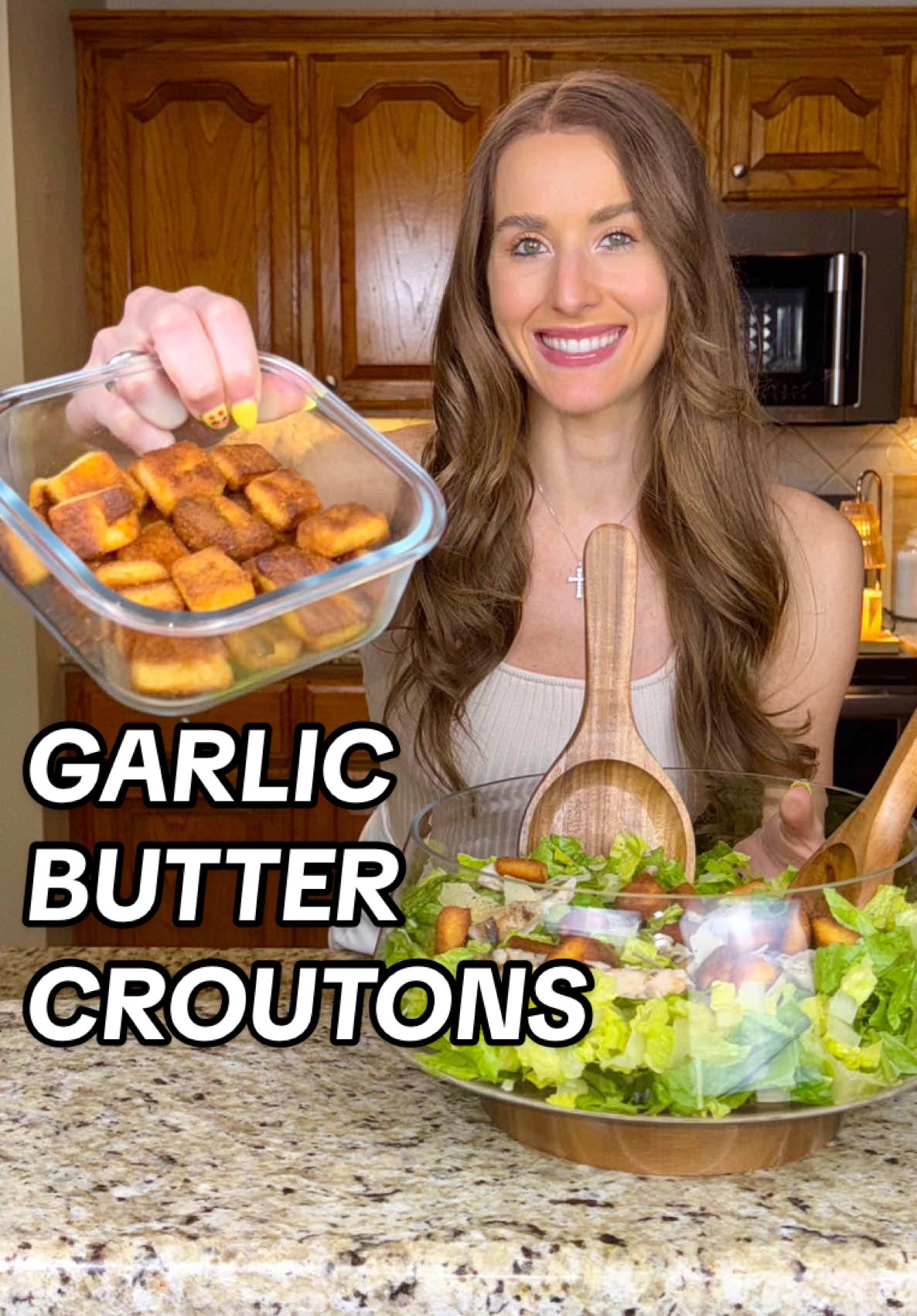 “Summer Salads” ep. 3: LOW CARB GARLIC BUTTER CROUTONS 🍞🥗 These homemade croutons are a great crunchy salad topper without the extra carbs! 🔗Links from the video on my LTK & Amazon! INGREDIENTS: -2 cups mozzarella cheese, shredded -3 tbsp cream cheese -2 eggs  -1/2 cup almond flour  -1/4 cup coconut flour  -1 tsp baking powder -1/2 tsp xanthan gum -1/2 cup butter, melted -2 tsp garlic powder  DIRECTIONS: 1. Preheat oven to 400 F.  2. Melt shredded mozzarella and cream cheese in the microwave. Add to a mixing bowl with the almond flour, coconut flour, baking powder, xanthan gum and eggs. Mix well. 3. Prepare a baking sheet with parchment paper and press dough into a rectangle on it. Poke some holes in it with a fork and brush with 2 tbsp of the melted butter. Sprinkle with 1 tsp of garlic powder.  4. Bake for 8 - 10 mins, or until golden brown. 5. Remove from the oven and cut into squares. 6. Over medium heat, melt the remaining butter in a frying pan. Add the remaining garlic powder to the melted butter then add in your bread squares. Stir until all the pieces are coated with butter. Brown for 5 mins, stirring as it cooks. 7. Place croutons back onto the baking sheet and bake for 16-18 mins or until they’re golden brown and crunchy. #croutons #garlicbuttercroutons #homemadecroutons #croutonrecipe #lowcarbcroutons #ketocroutons #lowcarbsalad #summersalad #ketosalad #saladrecipe #healthyrecipe #summerrecipes #saladtoppings #salad 
