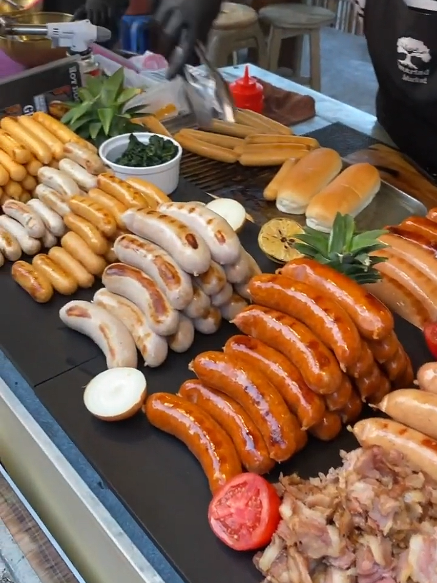 Bratwurst is a type of German sausage made from beef or, less commonly, pork or veal. The name is derived from the Old High German Brätwurst, from brät-, finely chopped meat, and Wurst, sausage, although in modern German it is often associated with the verb braten, to pan fry or roast. #germany #streetfood 