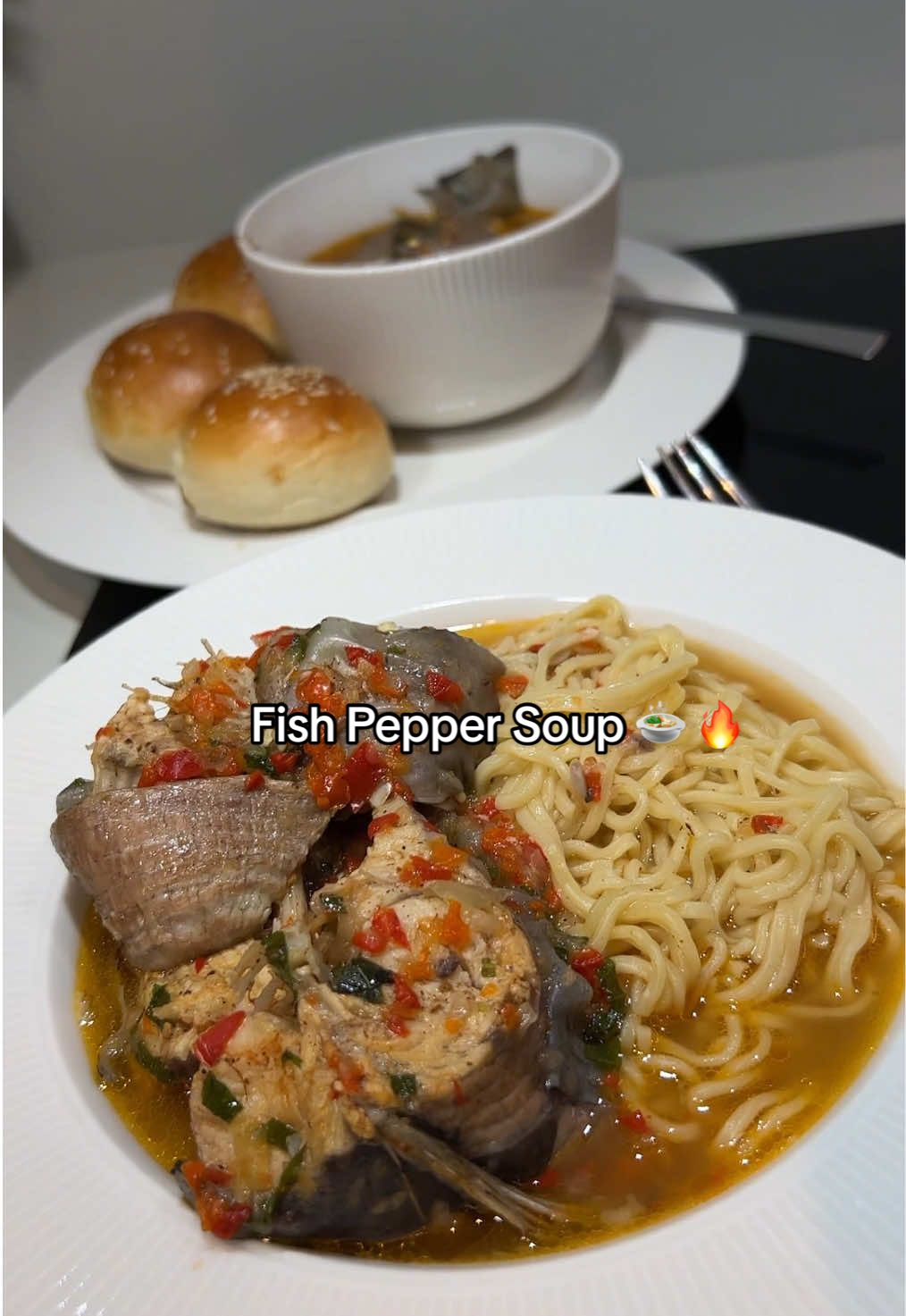 Delicious Fish Pepper Soup Recipe 🍲 🔥  Bread or noodles which one are you picking? What I used:  	•	Catfish 	•	Pepper mix (red bell pepper, scotch bonnet, onions) 	•	Pepper soup spice 	•	Seasoning cube 	•	Salt 	•	Aidan fruit 	•	Fresh basil #fishpeppersoup #catfishpeppersoup #foodtutorials #CookingHacks #nigerianfood #spicyrecipes #homecooking #FoodTok #comfortfood #noddlesrecipe #quickmeal 
