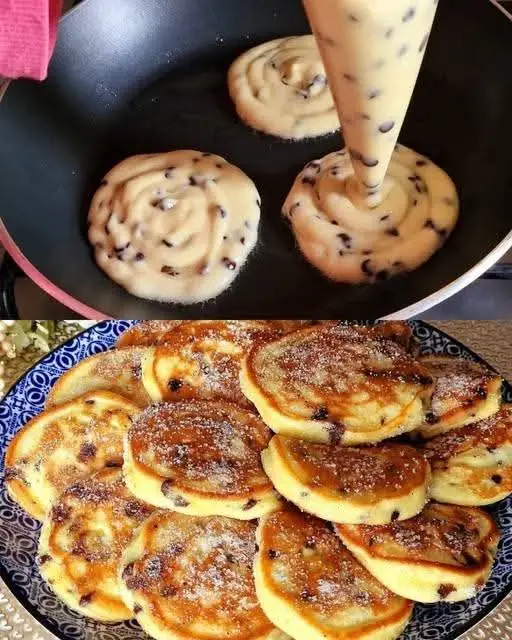 Tempo di preparazione: 10 minuti Tempo di cottura: 20 minuti Tempo totale: 30 minuti Ingredienti: * 1 uovo * 3 cucchiai di zucchero (45 g) * 1 bustina (8 g) di zucchero vanigliato * 3 cucchiai di olio (45 ml) * 125 g di yogurt (circa ½ vasetto) * 60 ml di latte (¼ di tazza) * 190 g di farina (circa 1 ½ tazza) * 10 g di lievito in polvere (2 cucchiaini) * 50 g di gocce di cioccolato (¼ di tazza) * Olio, q.b. per ungere la padella * Zucchero a velo (facoltativo), per decorare Preparazione: 1. Mescola gli ingredienti umidi: in una ciotola, sbatti 1 uovo con 3 cucchiai di zucchero e 8 g di zucchero vanigliato fino a ottenere un composto omogeneo. 2. Aggiungi gli altri liquidi: unisci 3 cucchiai di olio, 125 g di yogurt e 60 ml di latte. Mescola bene fino ad ottenere una consistenza liscia. 3. Prepara gli ingredienti secchi: in un'altra ciotola, setaccia 190 g di farina e 10 g di lievito in polvere. 4. Crea l'impasto: aggiungi gradualmente gli ingredienti secchi al composto umido, mescolando fino a ottenere un impasto liscio e senza grumi. 5. Incorpora le gocce di cioccolato. 6. Cuoci la torta: ungi leggermente una padella antiaderente con un po' di olio e falla scaldare a fuoco basso. Versa l'impasto nella padella e distribuiscilo uniformemente. Copri con un coperchio. 7. Cuoci a fuoco basso per 20 minuti, o fino a quando uno stuzzicadenti inserito al centro ne esce pulito. 8. Raffredda e servi: togli la torta dalla padella e lasciala intiepidire leggermente. Tagliala a fette e servila così com'è o con una spolverata di zucchero a velo. Un suggerimento goloso: questa torta è perfetta per una merenda improvvisata o una colazione golosa. Puoi arricchirla aggiungendo un po' di scorza di limone grattugiata all'impasto per un profumo extra! Buon appetito! Io ho provato di fare tipo pancakes. #torta #yougurt #gocce #cioccolato #ricette #facili #fate #in #casa #dolcevita #semplicità #cucinarechepassione #cucinare #bontà 