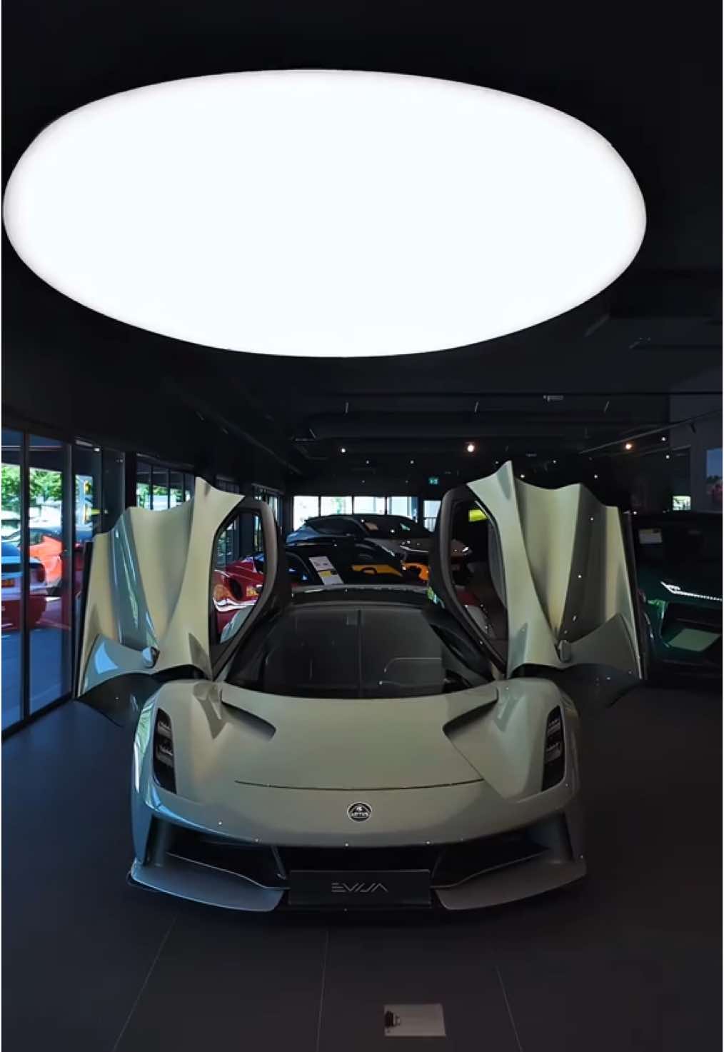 The Lotus Evija is an all-electric hypercar with 2,011 hp, 0–100 km/h in under 3 seconds, and a top speed over 320 km/h. Built with a carbon fiber body, it’s limited to just 130 units and overall very unique to see in real life — The Lotus Evija 🩶🤍              ︎                                      ︎  ︎  ︎#hypercar#lotus#lotusevija#evija#electrichypercar#cars#carsontiktok#fyp#viral