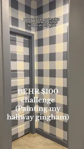 I gave our hallway a bold makeover with a gingham paint design using @BEHR Paint! #AD — I was challenged by BEHR to transform a space with just $100, so I grabbed my supplies and got to work. I used BEHR PREMIUM Plus Interior in Velvet Sky 570E-2 as the base color and layered Sonata Blue BNC-08 where the lines overlapped to create that true gingham look. This DIY took some serious prep (hello, endless squares), but the result is a total showstopper! What would YOU do with $100 and some BEHR paint? #BEHR #DIYonabudget #paintmakeover #ginghamwall #beforeandafter #homedepotfinds #painttransformation