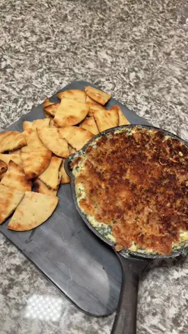 This was soooo fire!!!! Perfect app for when you have guests over @Longhorn Steakhouse inspired 😍💞  RECIPE ⬇️ Cream Cheese – softened to room temperature Sour Cream Frozen Spinach – thawed and squeezed dry Garlic Mozzarella Cheese Parmesan Cheese Panko Bread Crumbs Mayo Salt, Pepper & Parsley Start by combining the cream cheese (softened to room temperature), sour cream and frozen spinach in a large bowl. Next, stir in the garlic, shredded mozzarella cheese and shredded parmesan cheese along with the salt and a dash of crushed red pepper flakes. Give the ingredients a good mixing so they are evenly combined and then pour the dip into a baking dish. Bake at 375 for 15 mins or until bubbly  For Parmesan Topping:  Mix together a cup of parmesan cheese and panko bread crumbs for an added level of crispy, along with just a bit of mayo to bring it all together. Pop back in for 5 mins and broil. I served this with @Stonefire Authentic Flatbreads Naan rounds and baked them in the oven for 15 mins  #longhorn #longhornspinachdip #spinachdip #spinachdiprecipes #appetizerrecipe #appetizerideas #appetizerrecipes #cooking #cookwithme #cookingathometiktoktv #homecooking #homecook #homecookedwithlove #apps #creatorsearchinsights #fyp #fypシ #fypシ゚viral #fyppppppppppppppppppppppp #wehavefoodathome 