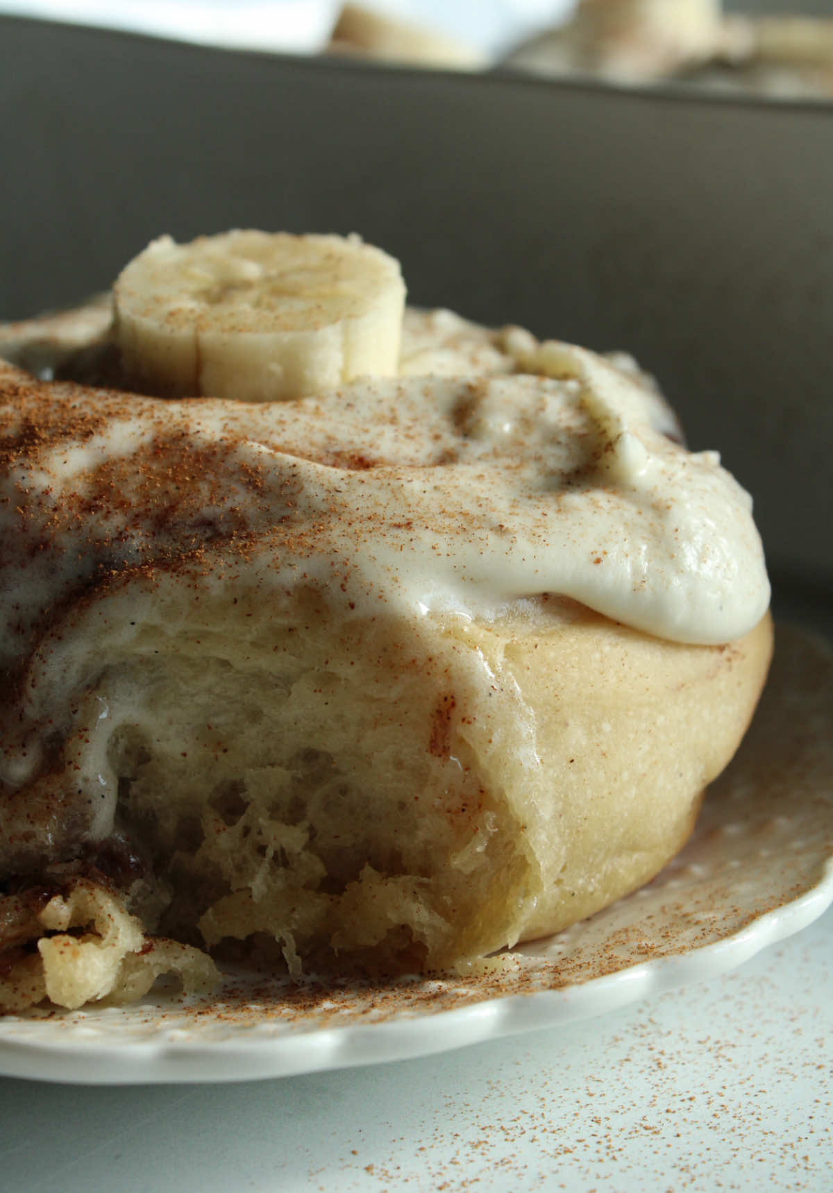Sourdough isn’t just for bread, here’s how I turned it into the softest cinnamon rolls ever!! Banana Cinnamon Rolls Dough Ingredients 670 g flour 400 g milk 70 g sugar  12 g salt 120 g sourdough 1 egg + 1 yolk 1 teaspoon Vanilla 1/2 tbsp cinnamon 90 g butter Filling 4 tbsp cinnamon 160 g butter at room temperature 130 g sugar 160 g banana slices (approximately 1 1/2 bananas) -Stir all the filling ingredients (except the banana slices) and let it rest at room temperature. Frosting 6 oz cream cheese (Philadelphia) 7 tbsp butter 1 tbsp vanilla extract 1/2 small banana 1 1/2 cups powdered sugar -Stir all the ingredients until you get a smooth  mixture. Steps  1. Mix all the ingredients except the butter and let it rest for 20 minutes. 2. Continue kneading the dough (by hand or machine). Once it looks smooth, start adding the butter little by little. 3. Once the butter is well incorporated, place the dough in a container and cover it to prevent it from drying out. 4. Let the dough ferment at room temperature until it rises 50-60% of its initial size (approximately 6 hours). 5. In a separate bowl , mix all the ingredients for the filling. 6. Roll out the dough very well and place your filling on top and the banana slices ,so you can roll it up (the dough is a little sticky so put  butter on the counter and on the rolling pin). 7. cut the roll into 7-8 pieces and place them in a mold where they are close to each other, with a little space between them as they will grow. 8. Let the rolls rise for three to four hours (or until they have doubled in size) 9. Once they're ready, place them in the oven for 30-35 minutes at 320°F. 10. Once your cinnamon rolls are ready, let them cool, add the frosting, and enjoy!! Important: This dough is very delicate and it is important that the dough does not over-ferment. The fermentation time will depend on the temperature of your kitchen/house.  #cinnamonroll #sourdough  #bananaroll #bakingathome #recipes #tips #cinnamonrollsrecipe #fyp #creatorsearchinsights  #CapCut  