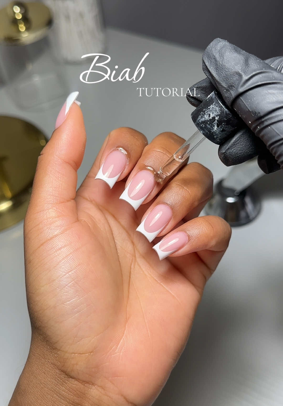 Who said your Biab can’t look like acrylics? Using @Glitterbels Builder gel in shade “Dolly”. @BeetlesGelPolish Top Coat and white gel.  #watchmeworkbiab #biabnails #buildergel #biabtutorial #biabwithtips #biabextensions #glitterbelsbiab #glitterbelsbuildergel #beetlesgelpolish 