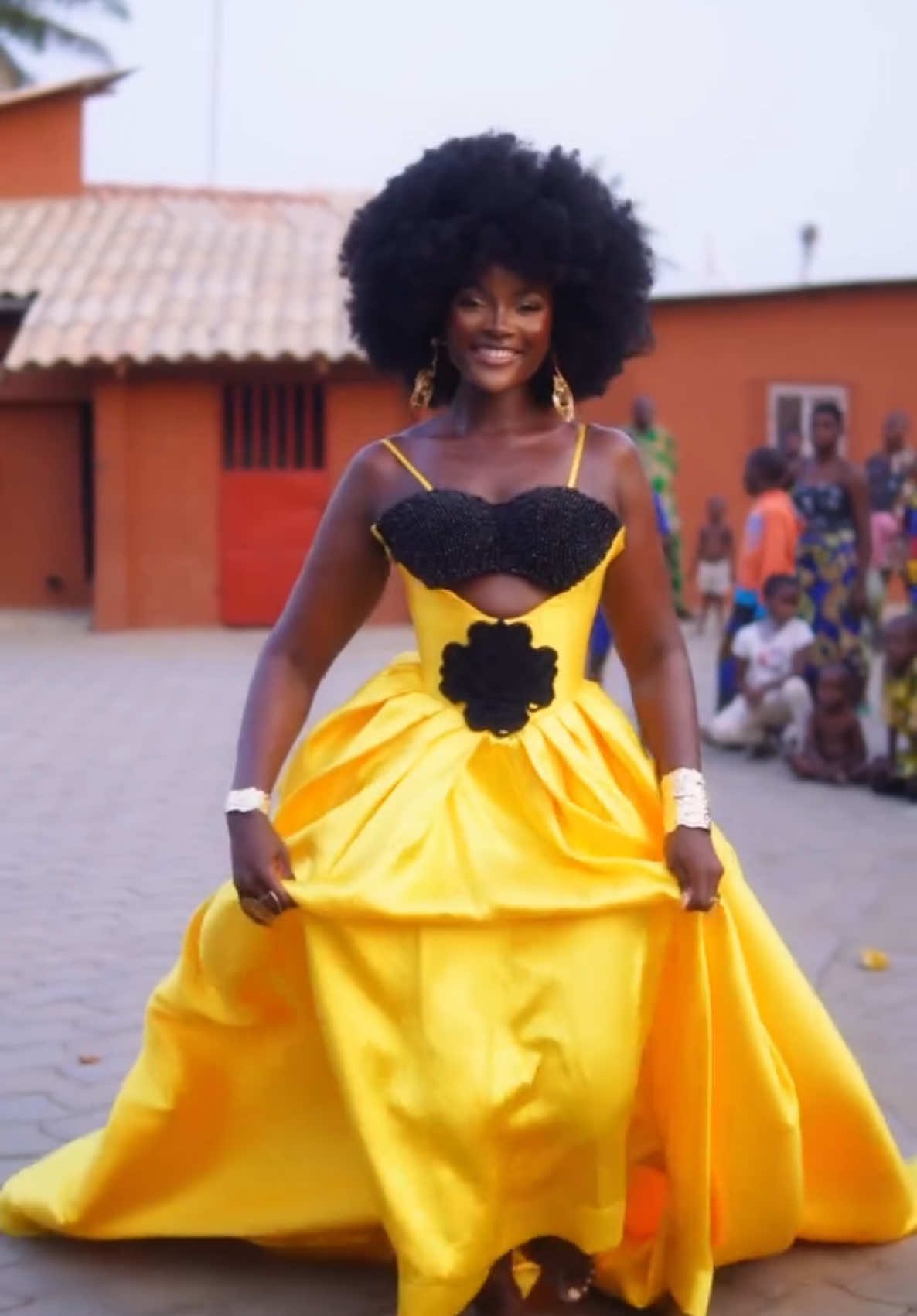 An African child, born of rhythm and sun. Standing tall where my roots run deep  Every laugh, every game, every dusty footstep… I remember. 🥰🥹 Nostalgia lives here.🥰❤️🙏🏾 . . Photographer: @bysappiah Videography: @femi_cott Models:@sonia_barbie_tucker x @olouwa.g Hair Artist: @afro_hair_addict Makeup Artist: @king_femy_ Caftans and Cowrie Crowns Look: @teedofficiel Yellow Gown: @teedofficiel Olouwa’s Rings & Necklaces: @sewarticles Sonia’s rings @trufacebygrace