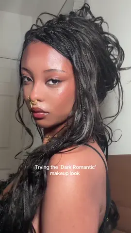 I was originally going for a witchy makeup but I think this name fits better ! >>>>>>  List of the stuff used: Base:  Kryolan- Digital Complexion Palette  Eadem - Mami Wata Mist Bronzer & Blush: Made by Mitchell- (Deep) Curve Case Eye: E.L.F: Expert Eyeliner (Black)  Made by Mitchell- (Deep) Curve Case (Brown pigment) Pixi X Hello Kitty - Anywhere Palette (Lighter Pigment)  Brows: Got2B: Styling spiking glue  ColourPop : Brow pencil (Soft Black )  Lip Combo: Made by Mitchell- Curve Case (liner)  Eadem- Le Chouchou (Bissap Glaze + Boba Bounce)  Finishing Spray (not shown):  Urban Decay: All Nighter  Jewelry: Earrings: Thrifted !   Piercings: Umanative ! 