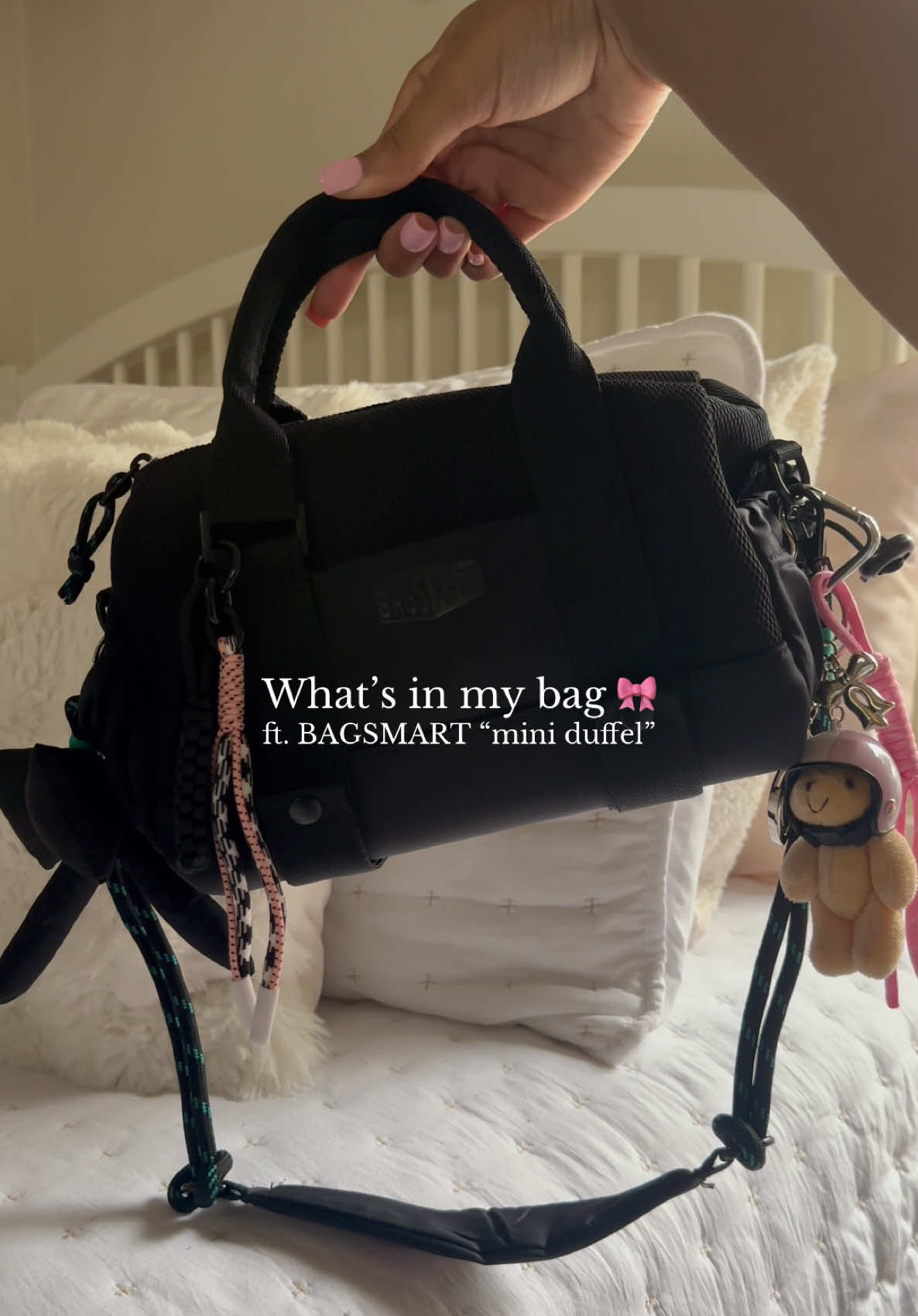I loveeee accessorizing every bag! The cutest duffel. Perfect for the gym, travel, or everyday wear. I highly recommend 🎀🫶🏽 #cutesy #bagaccessories #miniduffel #bagsmart #whatsinmybag #inspo 