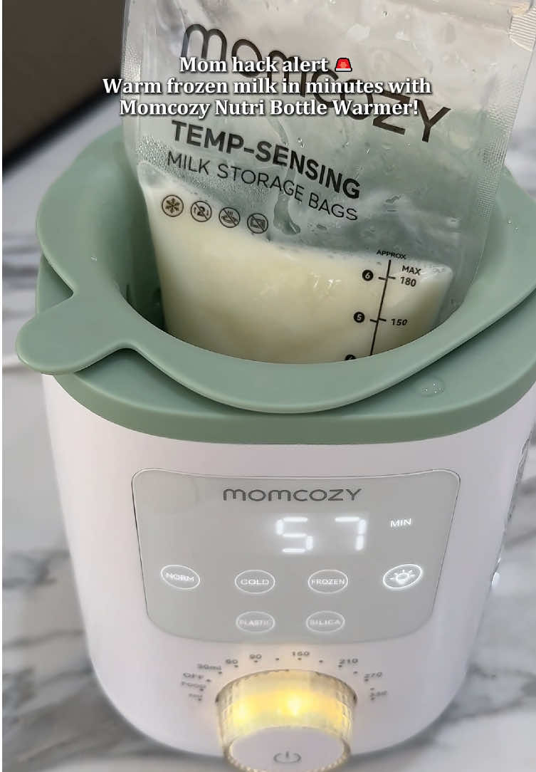 Mom hack alert Warm frozen milk in minutes with Momcozy Nutri Bottle Warmer!#momcozy #bottlewarmer #milkwarmer #mommusthaves #momhacks #sale 