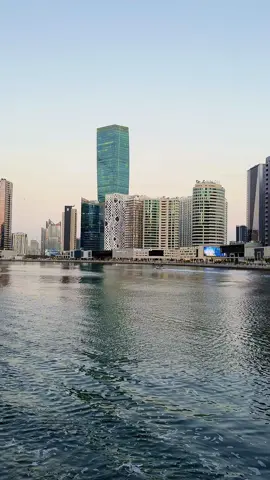 Part - 53 | Beautiful Skyscrapers along with Business Canal in Evening Time 🏝️✨☘️🙌🫶✍️. #dubaicanal #water #burjkhalifa #view #waterview #new #waterview #businessbay #evening #evening #walkway #newdubai #beautyofdubai #lights #address #fyp #foryoupage #lifeindubai #dubailife #businesshub #trending #viral #hit #beautiful #music #englishmusic 