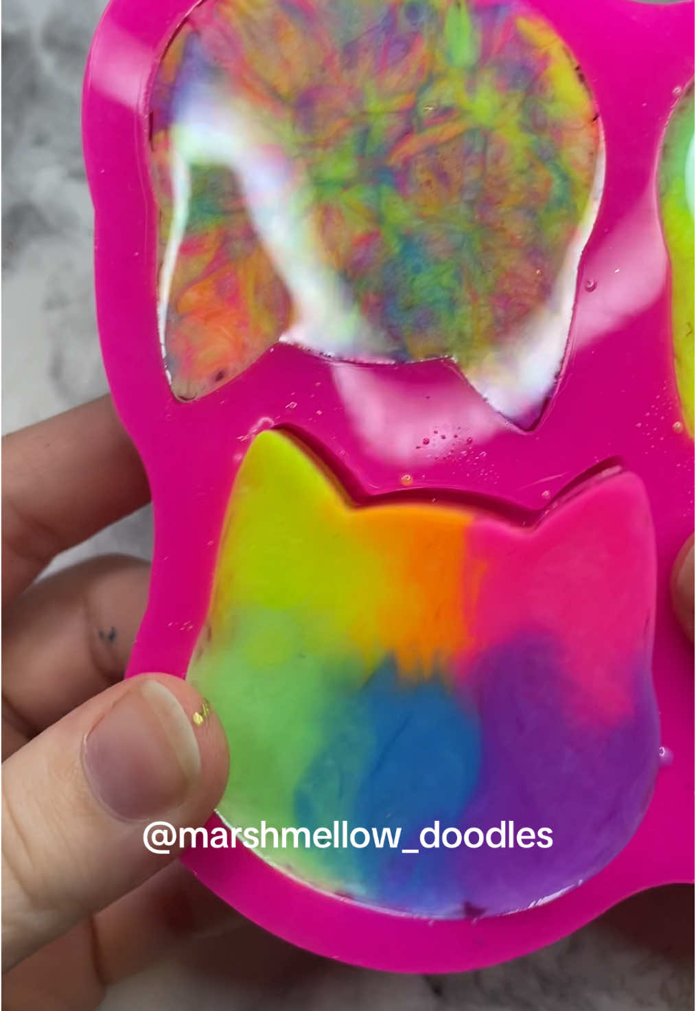🌈 Rainbow Cat 🌈 I made sure to film the unmolding of these but the camera can’t even begin to capture how bright these pieces are in person! Using one of my new molds from @heartsnskullz on Instagram  I had so much fun making these rainbow cats! I haven’t poured any rainbow pieces in a while and I for sure missed it! Should I bring back the rainbow!? 👀 I plan to make these beauties into keychains! Cause how amazing would a backpack or purse or keys be with one of these bright and glittery babies! 🌈 Supplies  Resin - @Resin Rockers Shop - use code marshmellow  Glitter - @lrisy - link in bio for a coupon  Mold - @heartsnskullz - use my code Marshmellow15  #catlovers #catkeychain #resinrockers #resinkeychain #resinobsession #resinobsessed #resinaddict #pastel #rainbowasthetic #mold #resinmold #siliconemold #catmold #demolding #unmolding #satisfying #satisfyingvideo #catart