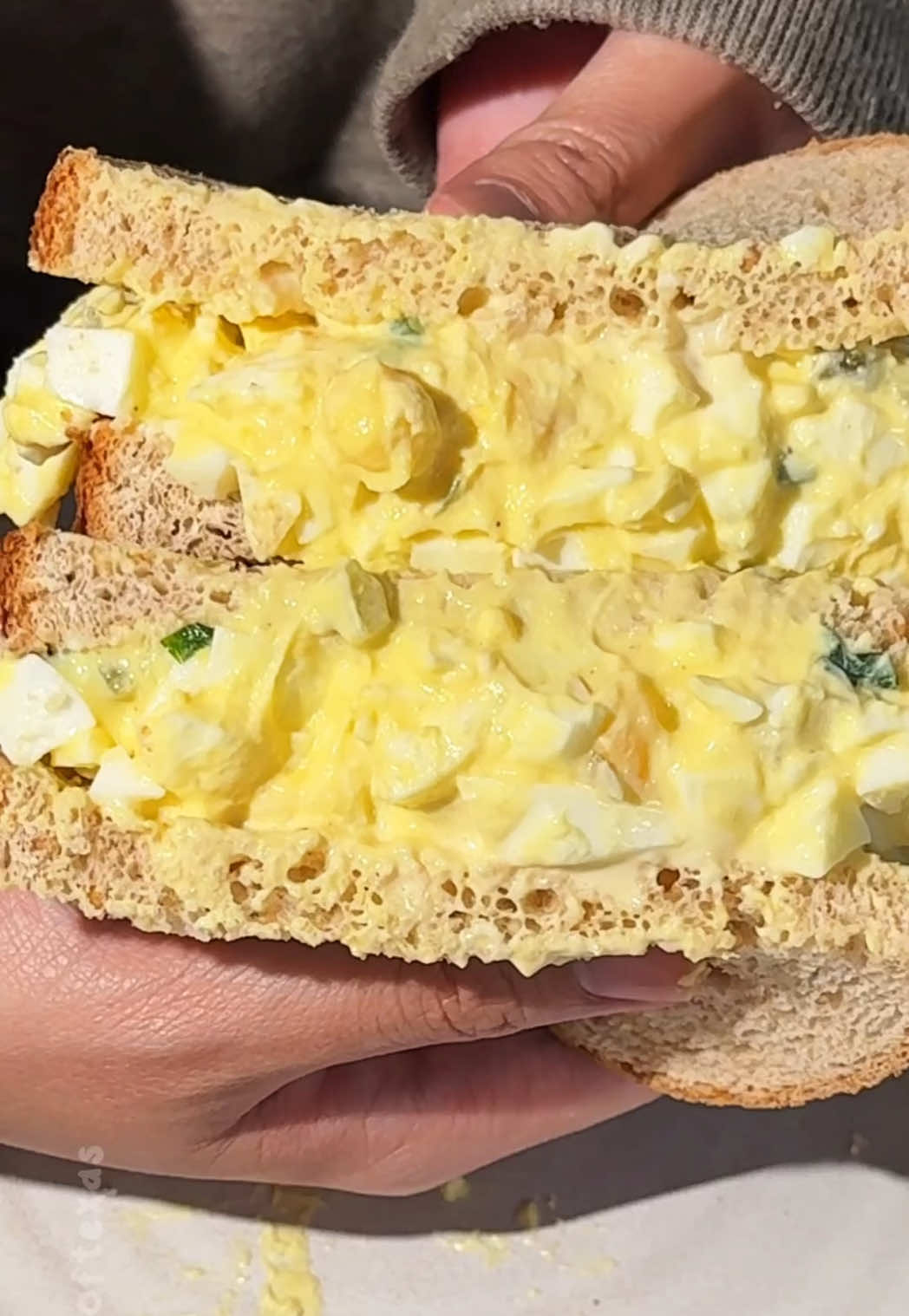 High Protein Egg Salad Sandwich Protein-packed and egg-cellent. This egg salad sandwich is around 30 grams of protein! Ingredients: 8 eggs 1/2 cup greek yogurt 1 stalk green onion 1 tbsp chopped pickles Salt Pepper Onion Powder High Protein White Bread  Mayonnaise  #highprotein #eggs #eggsalad #eggrecipes #asmrfood #EasyRecipes #lunchidea #healthyfood #fitnessfood #cleaneating #healthyrecipes