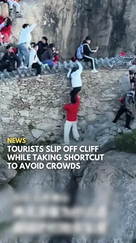 A man and woman visiting Mount Tai in China narrowly avoided a deadly fall after climbing over a safety barrier in an attempt to bypass heavy tourist crowds. The incident, which took place on 4 May, was caught on video and showed the pair slipping while descending a steep ledge.  The man became wedged between rocks, managing to hold onto the woman just in time and preventing a potentially fatal drop. Fortunately, neither was seriously injured. Mount Tai management said on 5 May that additional staff will be deployed to improve supervision in high-traffic areas. Follow @saysdotcom for more news updates. #SAYSnews 