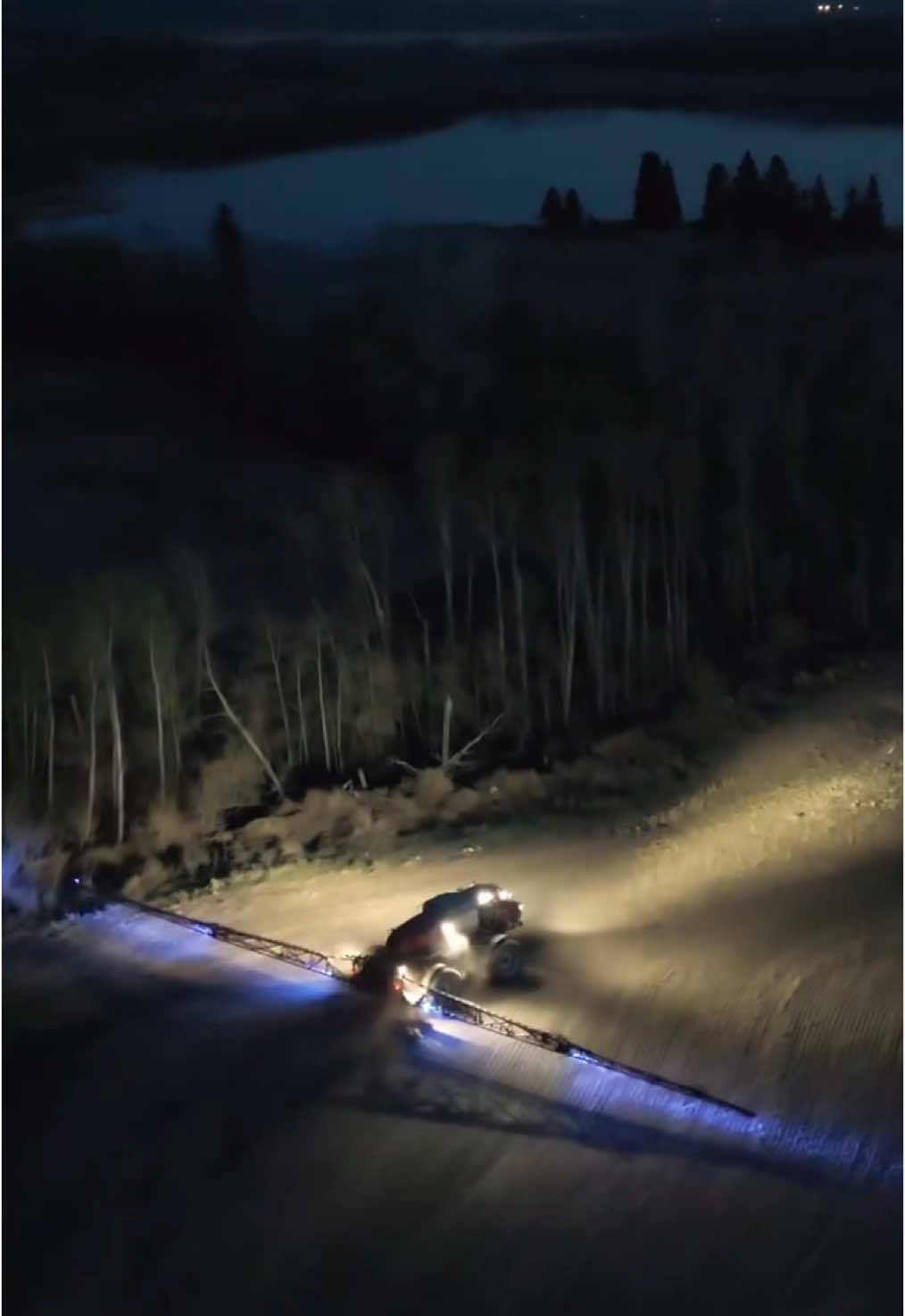 Spraying into the night 🌙 #spraying #crops #farmlife #farm #agriculture #farming #foryou #drone #caseih #epic #farmer #agro #booyah #foryourpage #agri #farmequipment #fyp #farmtok 