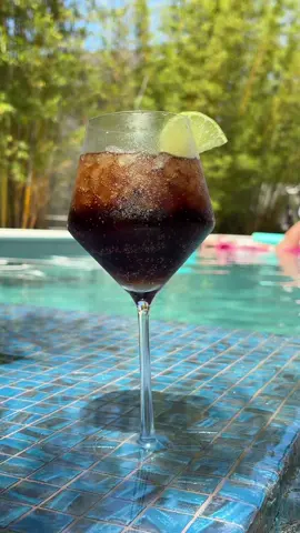 coke zero, lime, thin stem wine class, pebble ice, UV is 10  😮‍💨