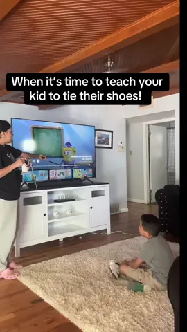 He’s going to learn today 😂!  #shoetying #teachingtime 