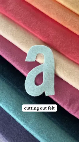 Getting a nice cut can really elevate your felt projects. There are a number of techniques I use to cut out my templates, but the most common by far is using freezer paper. With just some heat, it temporarily adheres to the felt making it easier to cut out your felt. This is especially helpful when there’s some smaller pieces or details like the cutout in this A.  Two bonus tips today: 1. Get a nice pair of scissors for your felt crafts and reserve them for just that purpose. It’s def not necessary, but worth it if you plan to craft with felt frequently.  2. Use a hair straightener if you don’t feel like setting up your iron. I do that all the time because it’s always easy to access.  ✨✨✨ Follow along with my felt craft fundamentals series. I’ll be sharing my favorite tips and tricks I wish I’d known when starting out and trying to convince you to give felt crafts a shot.  #felt #craft #DIY #toddlermom #feltcrafts #freezerpaper 