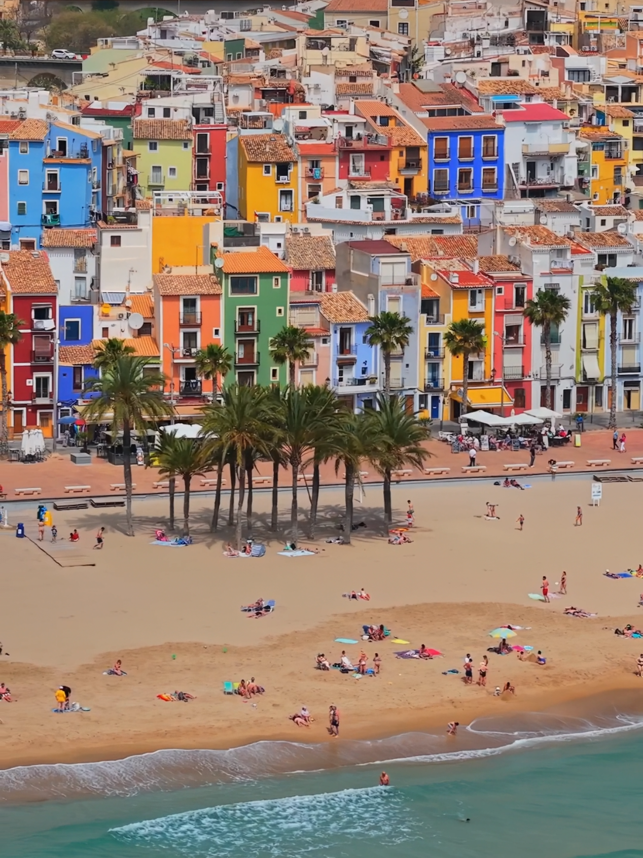 Teleport yourself to colourful Villajoyosa 🌈 #villajoyosa #spain #citybreak #holiday #beach #drone #dji #djiglobal #air3s 