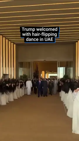 When Trump arrived at Qasr Al Watan, the presidential palace in Abu Dhabi, he was greeted with a striking ‘hair-flipping’ dance which quickly went viral.    This synchronised performance, is known as Al-Ayyala, a traditional cultural dance of the United Arab Emirates.    Trump returned to the White House last night following his four-day visit to the Middle East, which included stops in Saudi Arabia, Qatar, and the United Arab Emirates and resulted in substantial financial commitments to the United States from all three Gulf nations.    #usanews  #UAE  #donaldtrump  #dancer  #culture  #politics  #viralnews