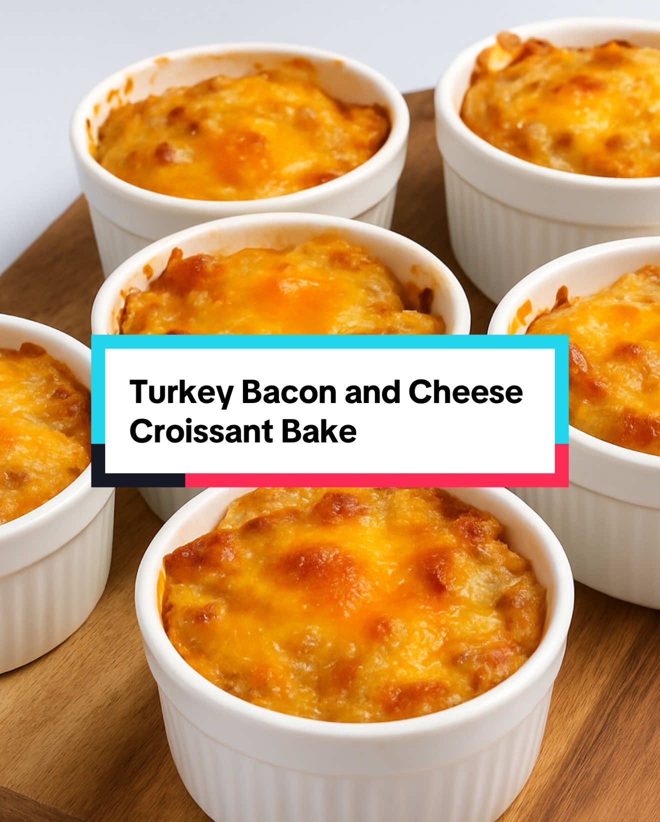 CROISSANT BREAKFAST BAKE (in ramekins!) Think casserole… but cuter, crispier, and 10x more delicious. ✔️ Cheesy ✔️ Savory ✔️ Meal prep or brunch ready  Here’s what you need: 3 large croissants (preferably day-old) 6 slices turkey bacon, cooked and chopped 3/4 to 1 cup shredded cheese (cheddar, mozzarella, or a blend) 6 large eggs 3/4 cup milk (or half-and-half for extra richness) Salt & black pepper to taste Optional toppings: chives, paprika, extra cheese, or Everything Bagel seasoning How to Make Turkey Bacon & Cheese Croissant Bake in Ramekins; ⭐️Preheat your oven to 350°F (175°C). Lightly grease six 6 oz ramekins with butter or nonstick spray. Place them on a baking sheet for easy transfer. ⭐️In a large bowl, tear croissants into bite-sized chunks. Add the cooked turkey bacon and shredded cheese. ⭐️In the same bowl, crack in the eggs, pour in the milk, season with salt and pepper, and gently mix everything until croissants are soaked. ⭐️Spoon the croissant mixture evenly into each ramekin. Press down lightly to ensure even soaking. Top with a bit more cheese or seasoning if you’d like. ⭐️Bake at 350°F for 25–30 minutes, or until the tops are golden and the center is set. Let cool for 5 minutes before serving. #breakfast #brunch #tiktok #fyp 