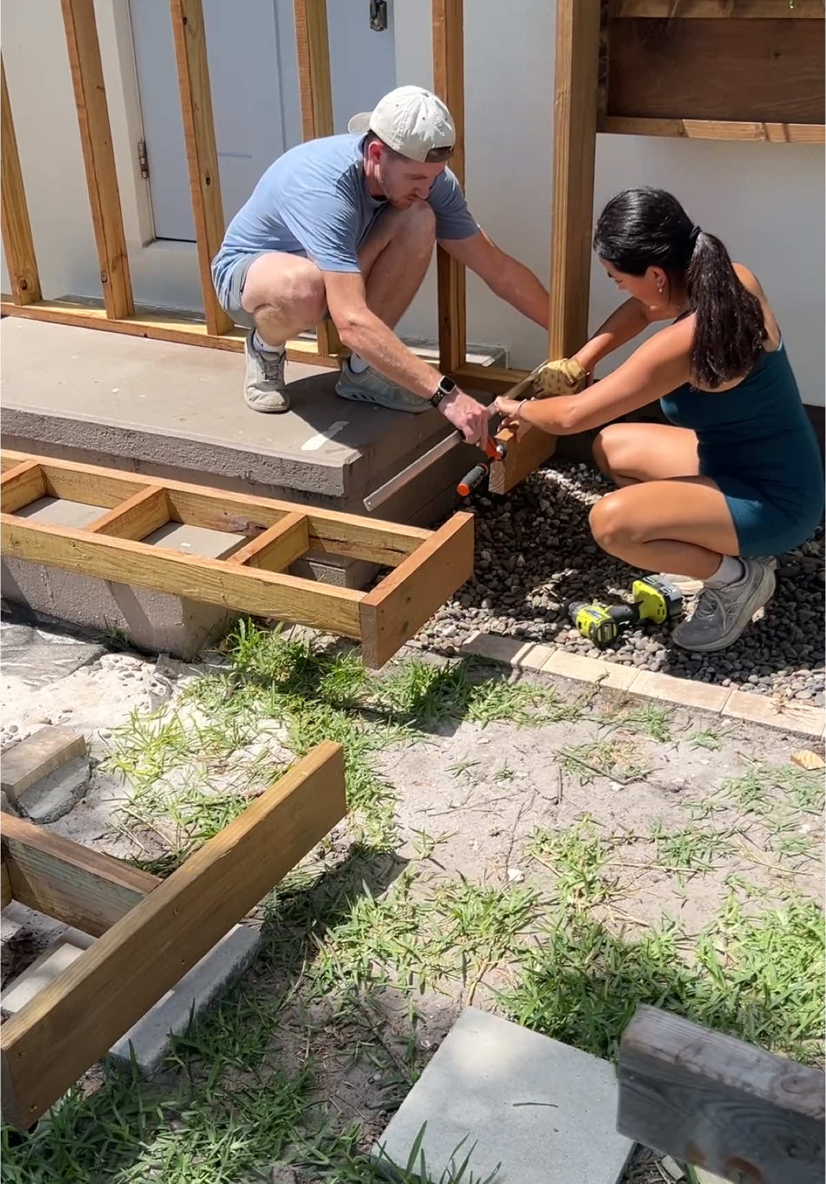 installing a wood porch to cover the concrete steps 🥹🫶🏼 #renovationseries #renovationproject #homeimprovement #diyhomeprojects #frontyard #homehacks #yardwork #homemakeover #hometransformation #backyard #construction #deckbuilding 