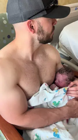 Forget the hot dad walk. This is so much better 🥵😍 #skintoskin #familychannel #newborn #muscles #strongdad #fyp
