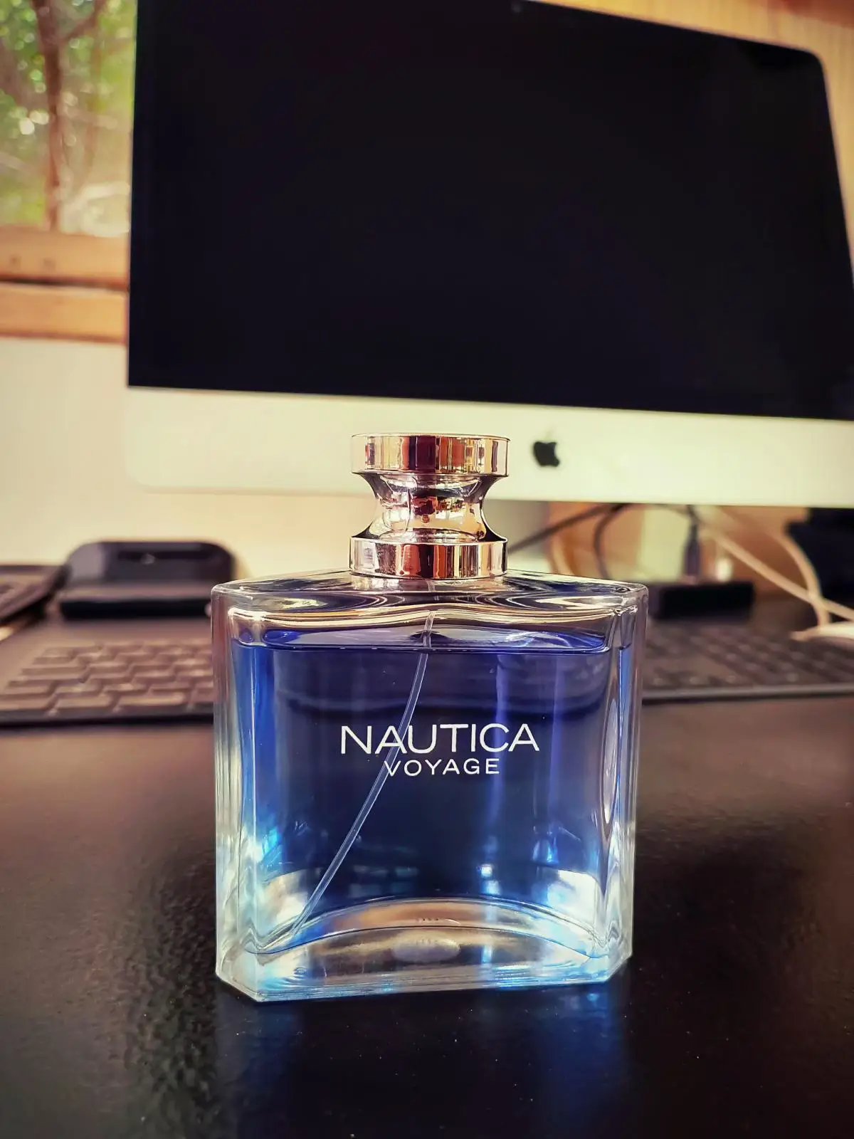 🌟Nautica Voyage🌟 Nautica Voyage, released in 2006 and crafted by perfumer Maurice Roucel, is one of those rare affordable scents that manages to feel timeless and refreshing without trying too hard. It’s the kind of fragrance that doesn’t shout for attention, yet somehow leaves a lasting impression—clean, breezy, and effortlessly cool. The opening is sharp and invigorating, with a crisp burst of green apple and leafy greens. It immediately brings to mind the image of standing near the ocean on a cool morning, the salty breeze mingling with the scent of fresh fruit. There’s something undeniably youthful and vibrant about this start—it feels alive, like the rush of wind against your skin. As it settles, the fragrance softens into a heart of lotus and soft florals, adding a gentle watery nuance that smooths out the sharpness of the top notes. The effect is calming, almost like clean linen drying in the sun, swaying in rhythm with the sea breeze. It’s never overpowering—just quietly fresh and pleasing. The dry down is where the scent anchors itself. Cedarwood and musk appear, adding depth and a whisper of warmth without breaking the overall freshness. The result is a light woody base with a salty, skin-like finish. It doesn’t try to be seductive or bold; instead, it offers a quiet confidence that feels natural and clean. In terms of performance, Nautica Voyage offers moderate projection—enough for others to notice in close range, but never loud. Longevity sits around five to seven hours, especially when worn on skin, and it can last longer on clothing. Sillage is soft, making it perfect for casual wear, close settings, or hot weather when you just want to smell fresh and put together. Nautica Voyage isn’t complex or niche. But that’s its charm. It’s simple, reliable, and has a laid-back charm that fits nearly every situation. For those looking for an easy reach, everyday fragrance that smells better than its price tag, this one remains a classic. #NauticaVoyage #MensFragrance #FreshScent #AffordableFragrance #CleanSmell #EverydayCologne #FragranceReview #PerfumeTok #ScentOfTheDay #MauriceRoucel #AquaticFragrance #CologneUnderBudget #TikTokFragrance #SmellFresh #FragranceForMen @Nautica 