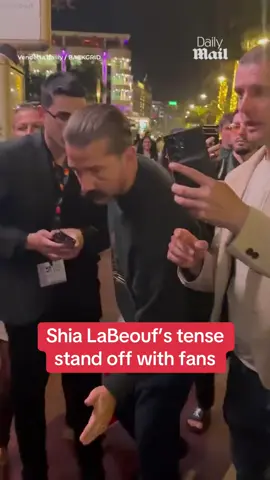 Shia LaBeouf showed remarkable maturity while in Cannes, France, as he was pestered by fans. The 38-year-old actor - who is promoting his documentary Slauson Rec at the Cannes Film Festival - was irritated after he was approached by swarm of aggressive fans and autograph seekers, TMZ reported. 🎥 BACKGRID #cannes #fan #celeb #shialabeouf #news 