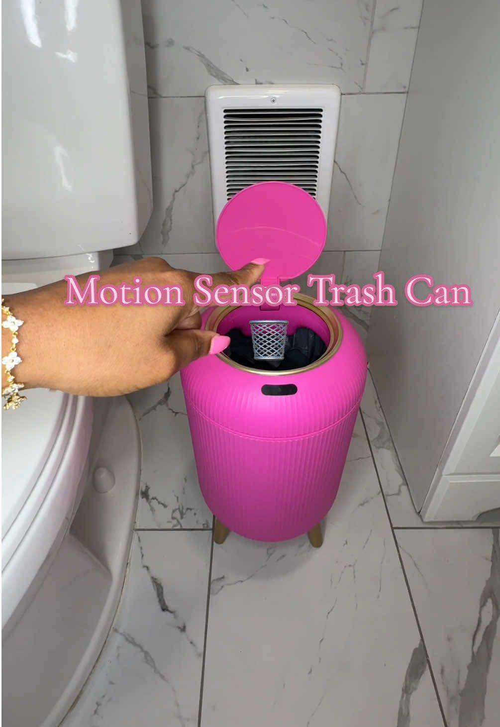Even my trash can got motion #pukomc #motionsensor #automatictrashcan #homefinds #pinktrashcan 