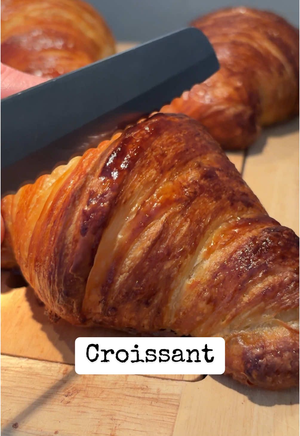 Really nice batch from last week ❤️ proofed from frozen overnight for 8 hours. Baked for breakfast. Croissant 300g Bread flour 200g all purpose flour 220g Whole Milk 350g poolish (see note) 13g Salt 40g Sugar 5g yeast (1.5 tsp) 220g Butter (unsalted)  for lamination Poolish:  175g all purpose flour  175g water (warm, not hot)  3g yeast (1 tsp)  Mix and ferment for 2 hours at room temperature or overnight in fridge (preferred)  If you maintain your own sourdough starter, this is a good time to use it to elevate the flavor of your pastries. Reduce the amount of poolish to 200g (100g water, 100g flour, 1/2 tsp yeast) And add 150 of recently fed starter or any discard you kept in fridge for no longer than 2 days. 1. In a large bowl, warm milk for 30 seconds in the microwave. Mix in poolish. 2. In a separate container, mix flours, salt, sugar, yeast. Combine with wet ingredients. Use wet hands to knead into a shaggy dough. 3. Move the dough to a clean bowl and rest in a warm area for 30 minutes. 4. Fold the dough on itself several times, then rest for another 30 minutes. 5. Repeat folding, flatten the dough, wrap, and freeze for 3 hours 6. Prepare a butter block: Flatten 220g of butter between parchment paper to 0.5-1 cm. Chill in fridge for 30 minutes. 7. Flatten the dough on a floured surface. 8. Place the butter block in the center, fold the dough to seal the butter, and roll out to 1 cm thick. 9. Fold each end toward the center, then fold like a book. Freeze for 30 minutes. 10. Roll the dough to 1 cm thick, fold into thirds, wrap, and freeze for 2 hours. 11. Flatten the dough to 0.5-1 cm thick. 12. Cut triangles with a sharp knife or pizza cutter. 13. Roll triangles from base to tip and place on a sheet, tip side down. 14. Proof for 2 hours or store in an airtight container for up to 1 week (defrost and proof takes 6-8 hours from frozen). 15. Preheat oven to 220C for 30 minutes. 16. Brush pastries with egg wash. 17. Place in oven, lower to 200C, and turn on convection. Bake for 10 minutes, rotate pan, and lower to 190C. 18. Bake for 7-9 minutes more. #food #asmr #croissant #butter #Recipe #fyp